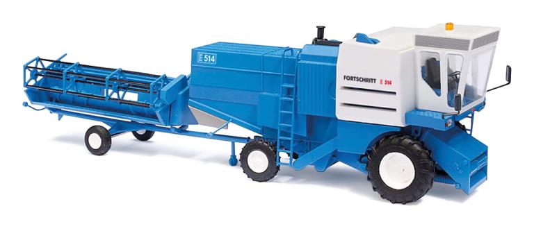 Mähdrescher Fortschritt E514 (Baujahr 1982) blau weiß mit Getreideschneidwerk und Transportwagen